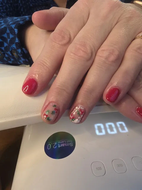 Red and gold floral gel manicure