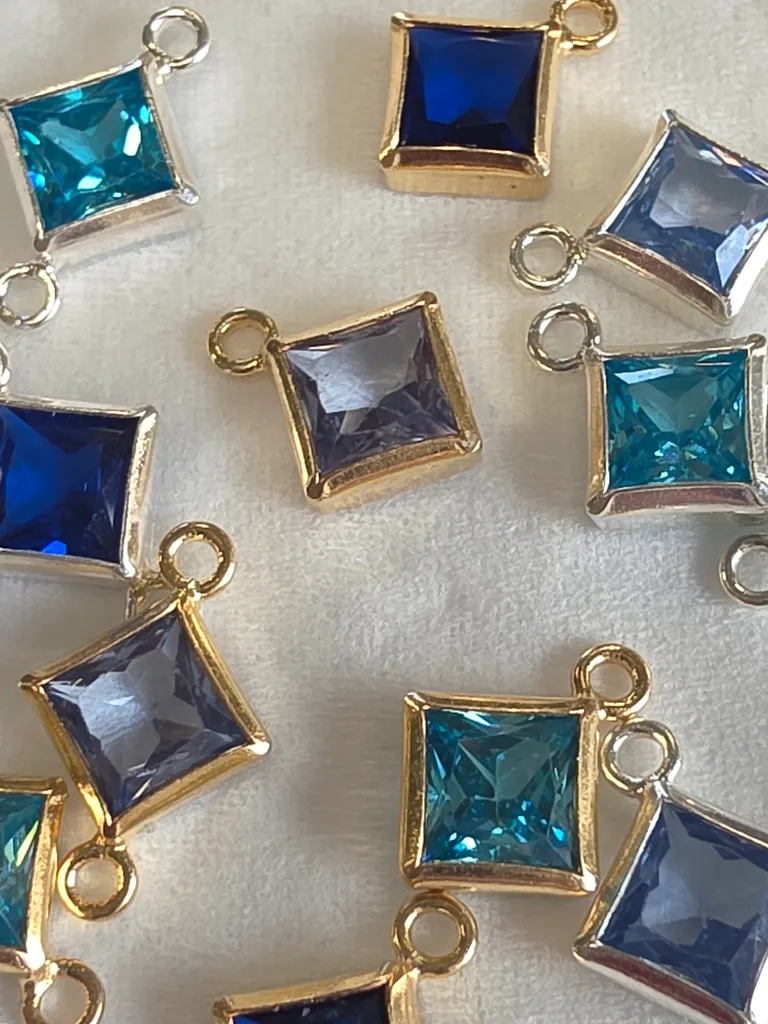 Blue permanent jewellery charms