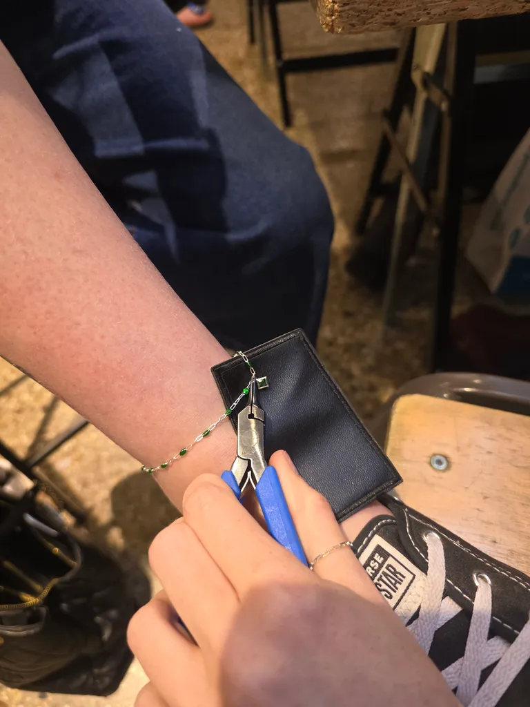 Georgie welding a permanent bracelet