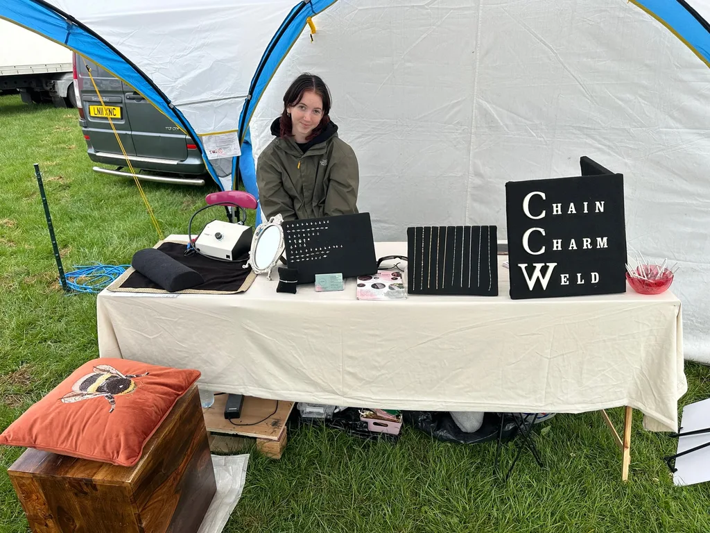 Georgie at an outdoor Elysium permanent jewellery pop-up